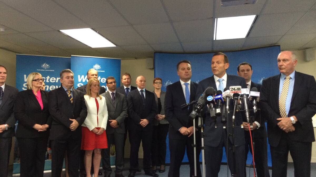 Prime Minister Tony Abbott announcing an infrastructure package for western Sydney at Liverpool Council buildings today.