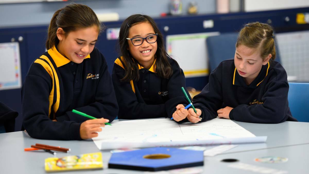 CREATIVE THINKING: Philippa Rupapera, Myiesh De Leon and Phoebe Walter brainstorm as part of the NBN STEMpreneur initiative in Ballarat. Picture: Adam Trafford